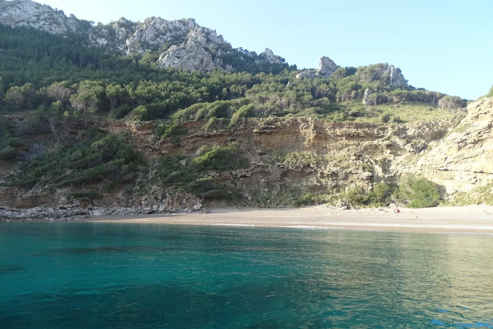 The cove and cliffs the boat visits on the way back to Can Picafort
